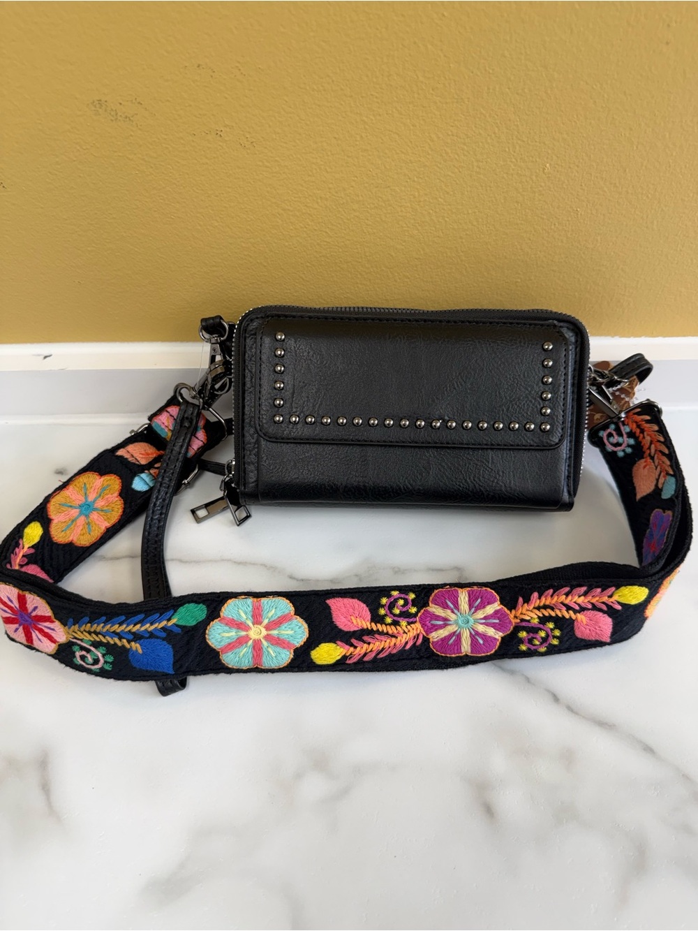 Black Studded Crossbody Wallet with Embroidered Floral Strap